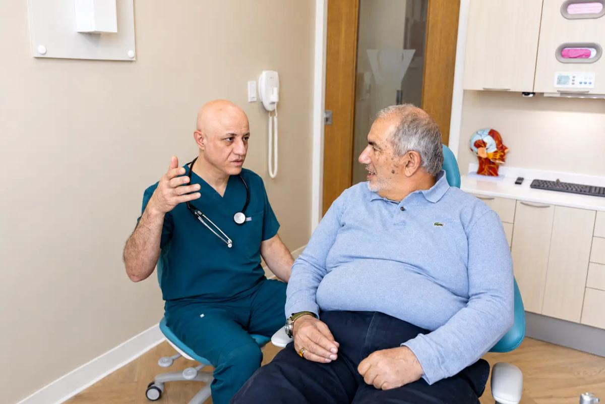 Dr. Sabah Jarullah talking with a patient about sleep at Westside, Calgary SW