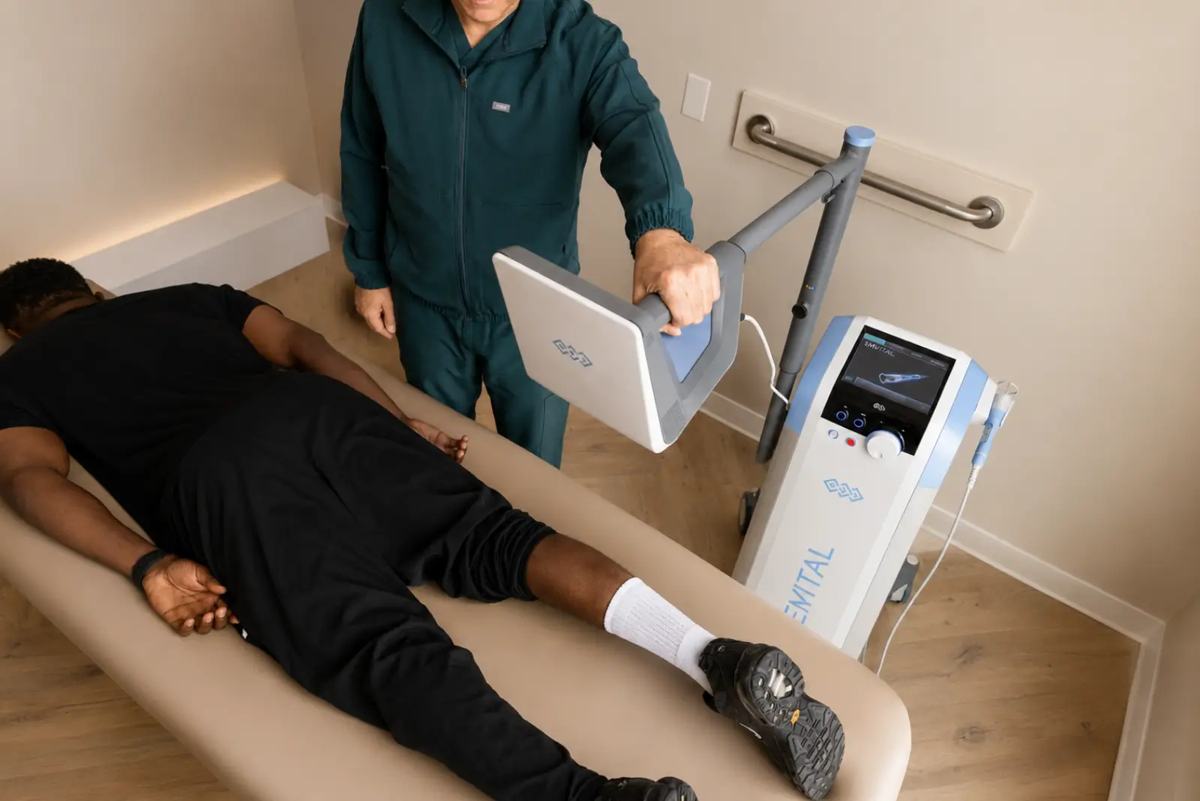 EMVITAL® laser therapy applied to the back at Westside, Calgary SW