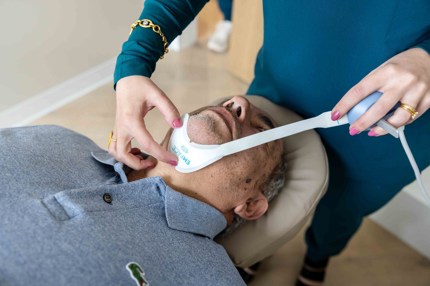 EMFACE® submentum applicator placed under the chin for a snoring protocol at Westside, Calgary SW
