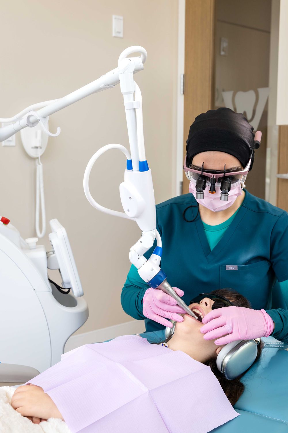Dr. Zubaida Hussain treating a patient with the Solea® laser