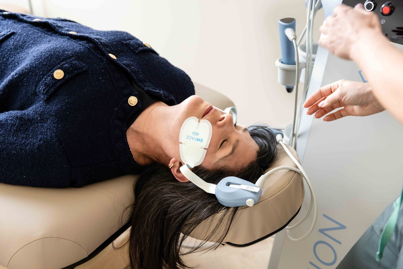 A patient during an EMFACE treatment at Westside